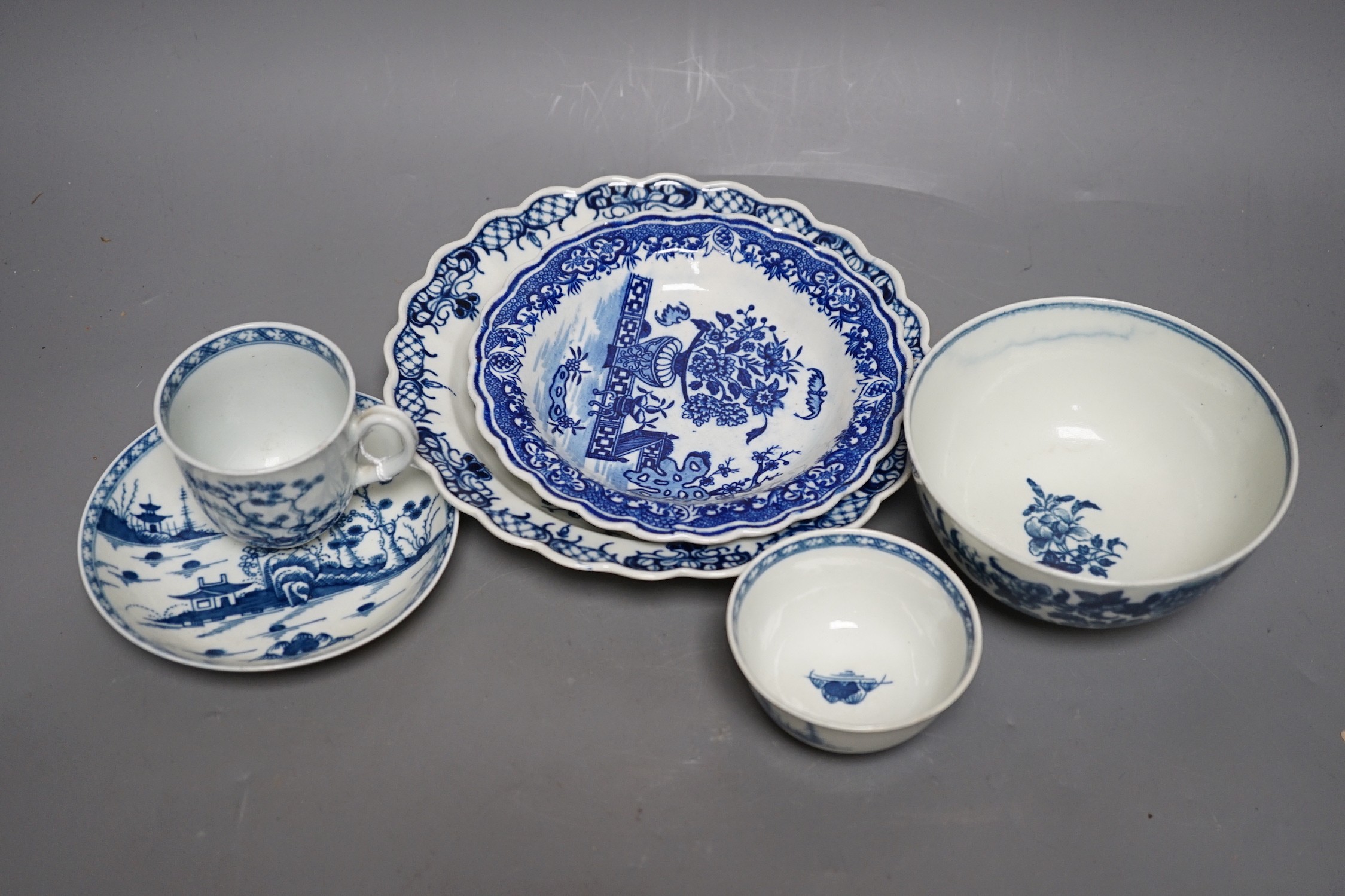 A Worcester teabowl, coffee cup and saucer painted with the Cannonball pattern, a rare napkin plate with the Bat pattern, a medium size Pine Cone plate and a Fence pattern bowl